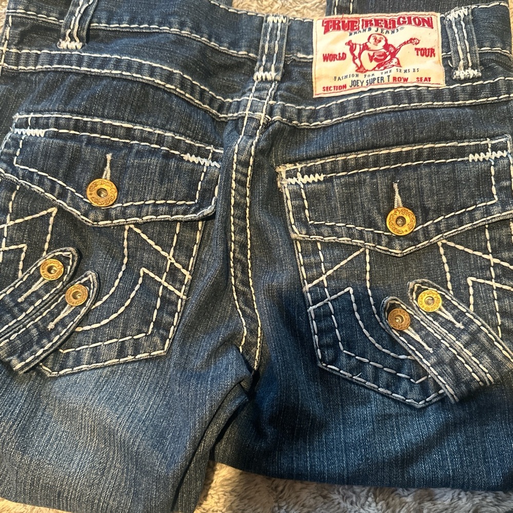 true religion blue jeans with white thread